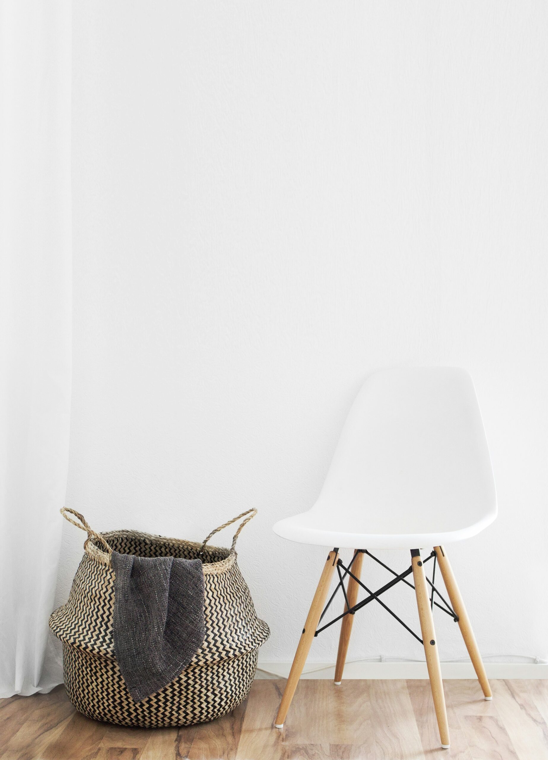 white and brown chairs beside wicker basket near white wall, 생계급여